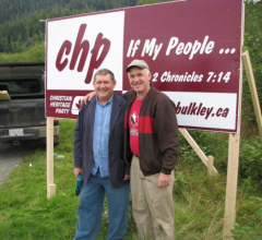 2008 Two buddies Don and Ron helping put up signs in Prince Rupert